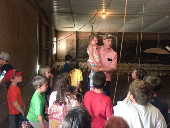 Brown Farms owner, Jeremy Brown, speaking to a group of students about poultry farming. 